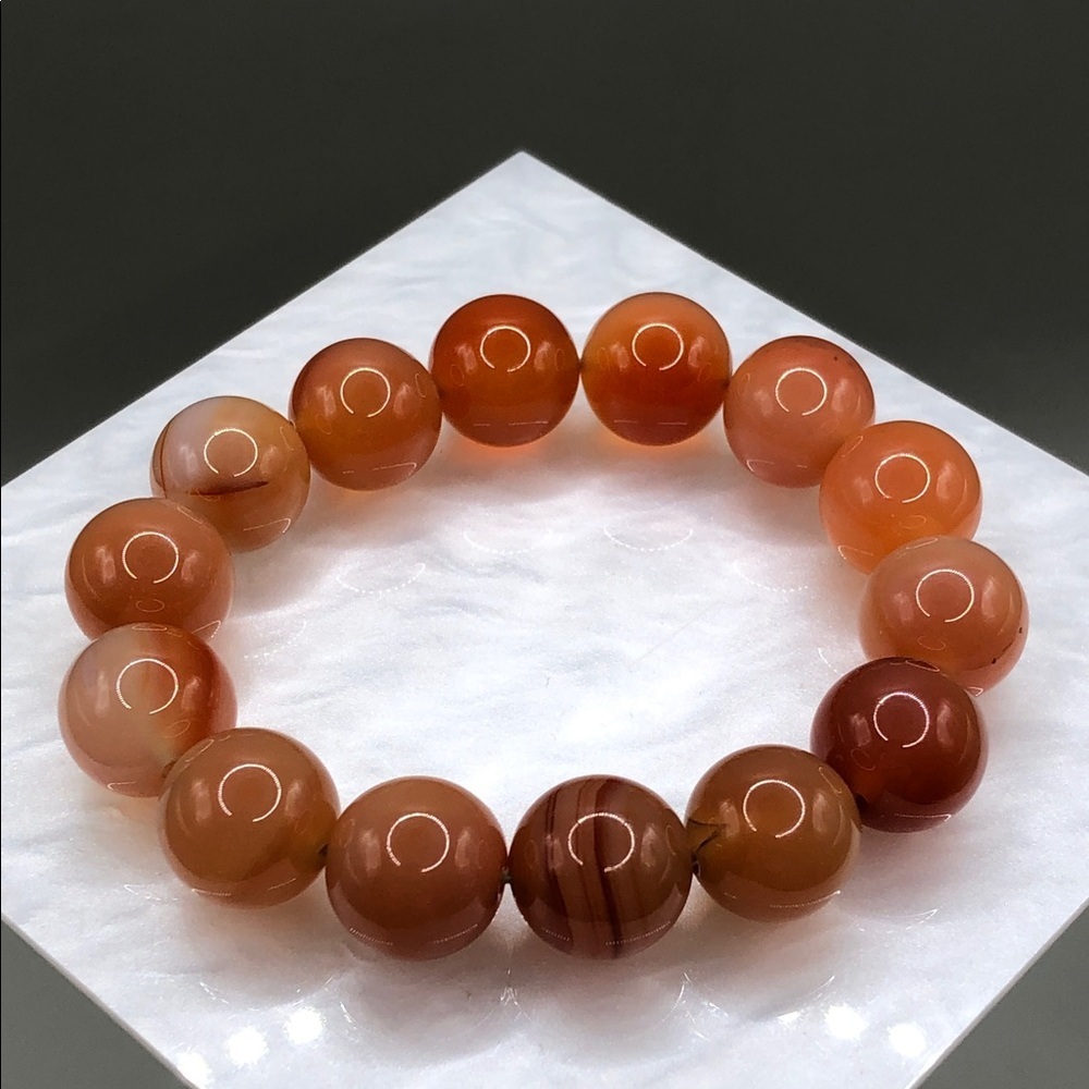 Orange agate smooth round bead roll on bracelet boho stack layer.